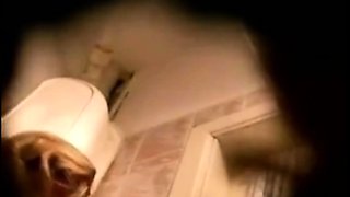 stepmom's toilet visit (spy cam)
