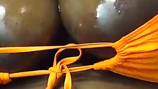 Black BBW Teases with Her Oily Tits