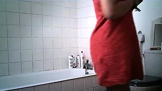 Spy Camera Watches Big Tit Amateur Milf In The Shower