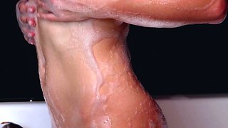 Petite MILF from Ukraine in a bath tub