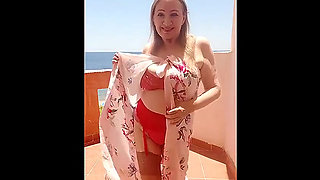 I dance in nice red lingerie and stockings and in the end I show my huge boobs and play with them