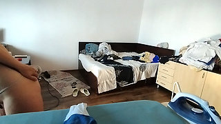 Sexy wife doing housework naked. Brunette, hairy pussy, big ass, big tits. Sexy mom massages herself with a vibrator.
