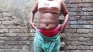 Young desi doll Skakoi enjoying a shower outdoors