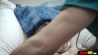 Doctor gives patient a sponge bath and vaginal probe