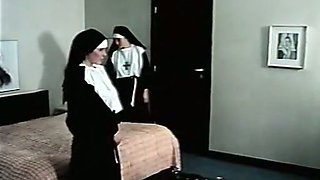 Two young and naughty nuns having orgy with two guys