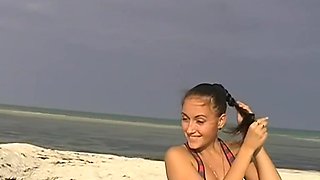 Viktoria in a really hot couple fucking on a sandy beach