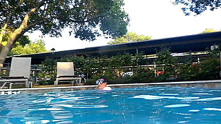 Couple Underwater Diving and Swimming