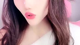 Japanese babe in schoolgirl uniform masturbates