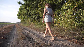 Hot Amateur Girl Flashes Thong Ass Under Skirt While Walking in Park