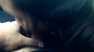 Naughty Asian girlfriend delivers a POV blowjob in the car