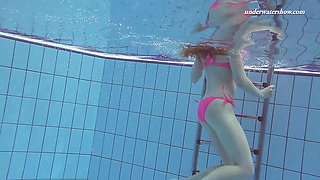 Cute pink bikini babe Lera underwater