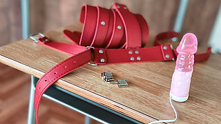 A Woman Is Being Punished While Wearing a Vibrator-equipped Chastity Belt.