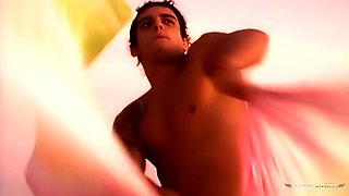 Two really attractive women engaged in intimate and intense sexual activity with a man on the beach