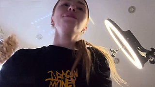 Close-up of a cock-squeezing pussy stretched by a pink fake penis