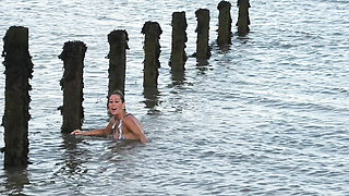 Naked MILF Skinny Dipping in the Sea.