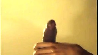 Black guy jacks off his big cock and cums hard