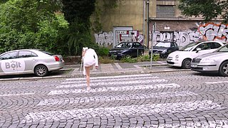 Sexy European teen flashing her tits and pussy in public