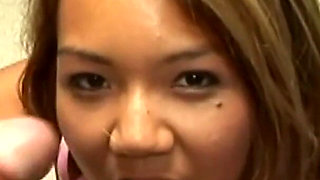 Asian teen gives perfect handjob