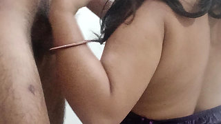 Husband wife romance in bedroom.
