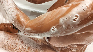 Amateur tanned girl with natural tits in bathroom