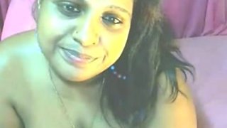 Indian auntie on webcam teases me with her big titties