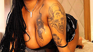 Sexy, Busty Black Girl in a Beautiful Black Dress, Showing Her Big Tits, While Gently Touching Herself