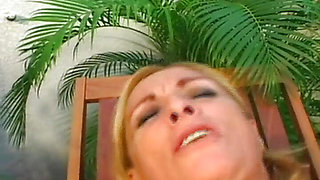 Blonde Granny Gets Her Bush and Ass Screwed by a Young Guy on the Sunbed