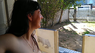 My wife pissing naked outside while she is walking around