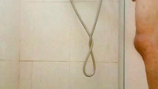 I was taking a shower while masturbating suddenly my man came in and looked at my whole body