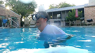 Couple Underwater Diving and Swimming