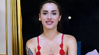 Small titted brunette Sharron with glasses masturbates