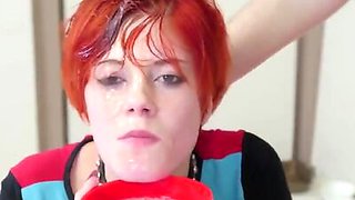 Redhead slut drinks cum and licks man's ass