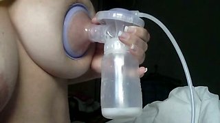 Kinky amateur ex wife of my buddy collects some milk from her boobies