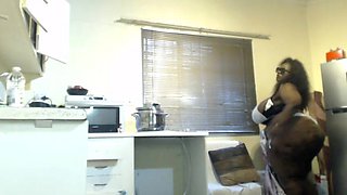 African Stepmum Stripteasing and Masturbating at Then Kitchen