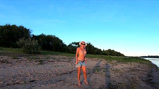 Russian Nudist on the River Shore
