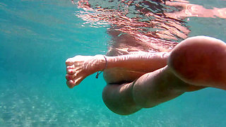 Nudist masturbating at the Beach and underwater! Exhibitionist young girl show