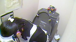 Japanese pretty waitress spied in a toilet masturbating