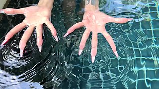 Long Red Nails and Long Fingers in Swimming Pool