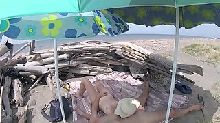 On a nudist beach in the Canary Islands, the stepfather touches his stepdaughter's pussy while she masturbates his shaft until she cumshot - MissCreamy