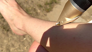 Trimming my bush and my hairy legs closeup outdoor