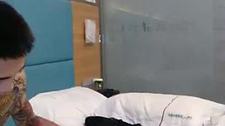 Tattoo guy and big-tits girl checking in hotel room with double show