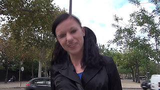 Vanessa , a pretty brunette, shows off on the Champs Elysees