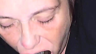 Mature Cocksucker Eats a Black Cock
