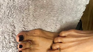 Black Nail Polish sy tiny feet with long toes with toe rings