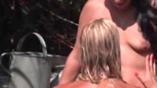 Lovely babes getting fucked in orgy by the swimming pool