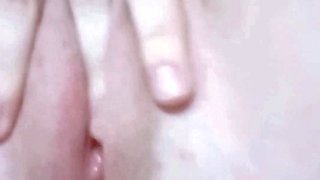 her white and clean pussy masturbating with her fingers inside it until she moans
