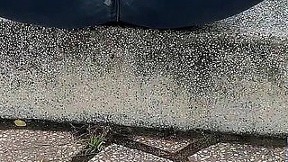 Public Wetting Jeans in Park Near the Beach