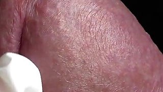 Glans Game with White Latex Gloves in Super-closeup