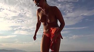 Stranger pulls his cock out on the beach