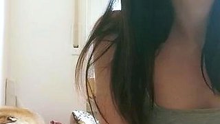 Small titted brunette teen fingering on the bed